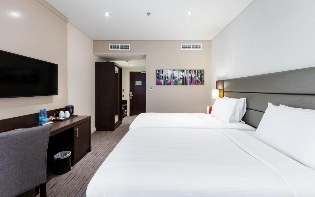 Premier Inn Doha - غرف